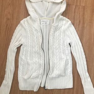 White zip-up knit sweater